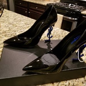 Yves Saint Laurent (YSL) heels with signature heel